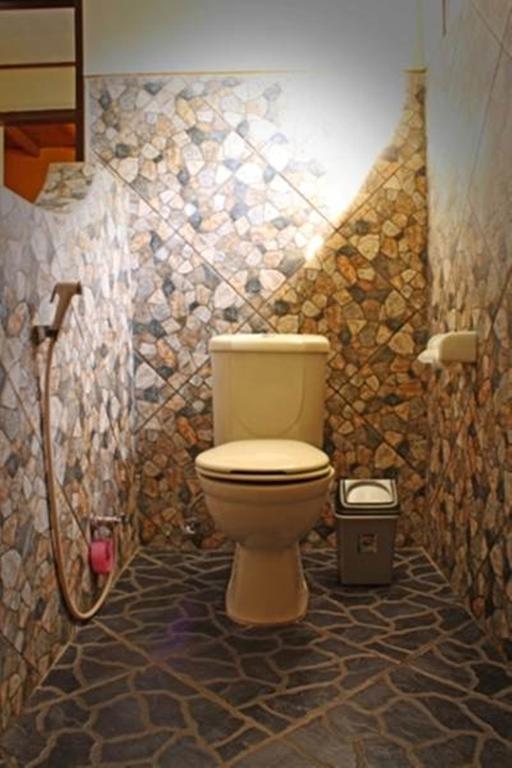 Guru Ratna Apartman Munduk Szoba fotó